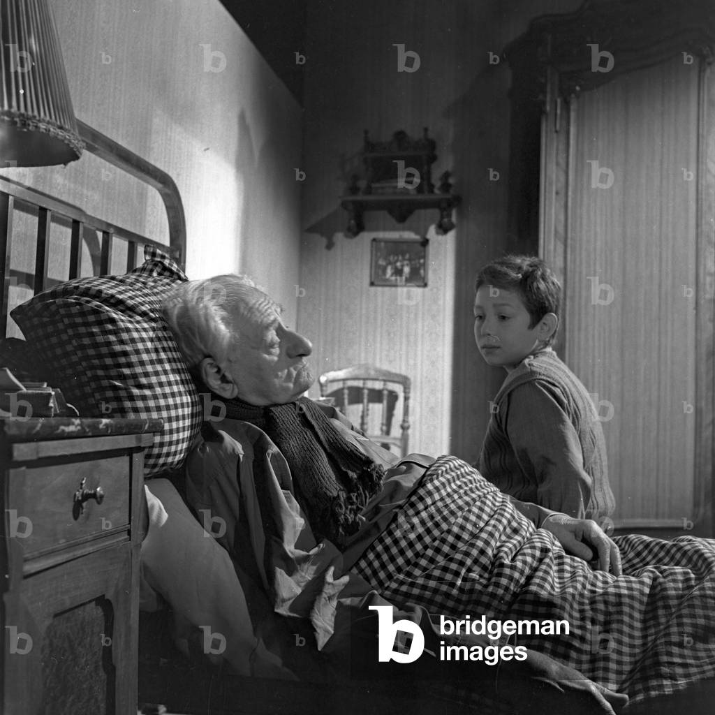 Sick grandfather and little grandson in a TV movie of NDR, Germany 1960s