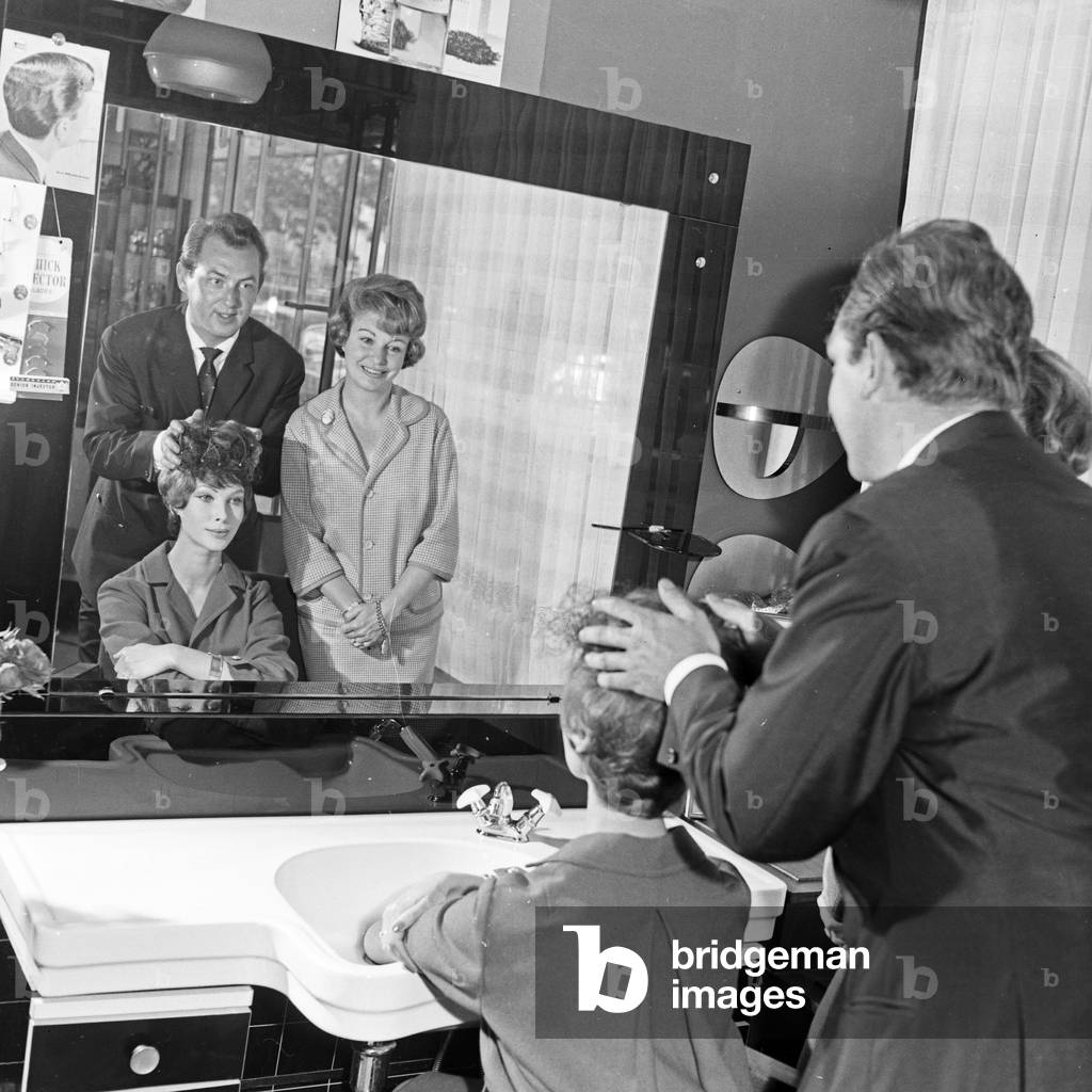 Hairdresser Dietrich Haak at work in Hamburg, Germany 1960s