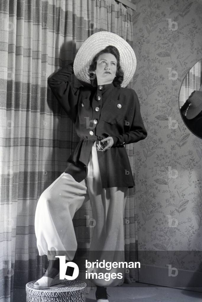 On the occasion of the Wiener Modewoche, a model is presenting new casual clothes in the house of fashion 