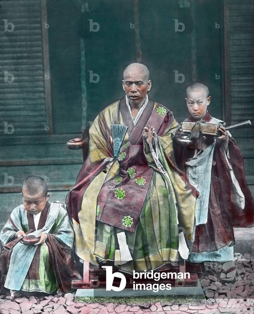Japan, Buddhist teacher with pupils, image date: circa 1920. Carl Simon Archive