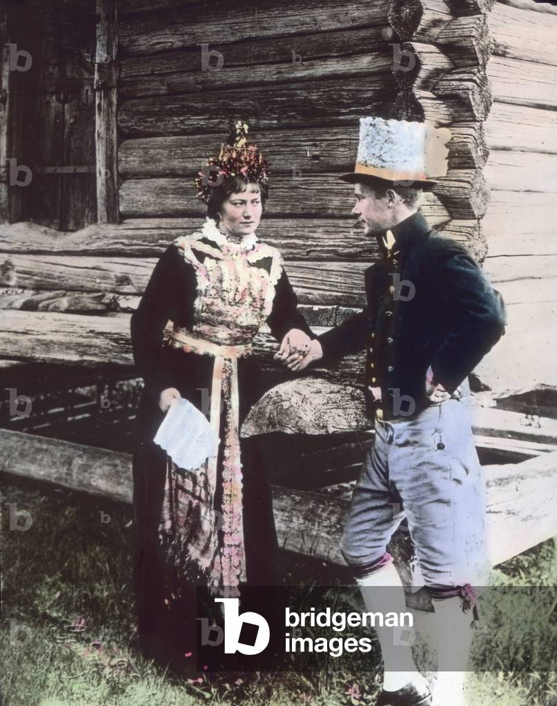 Sweden, Province of Dalekarlien ( Dalarna ), Bridal couple wearing traditional costume. Image date: circa 1920. Carl Simon Archive