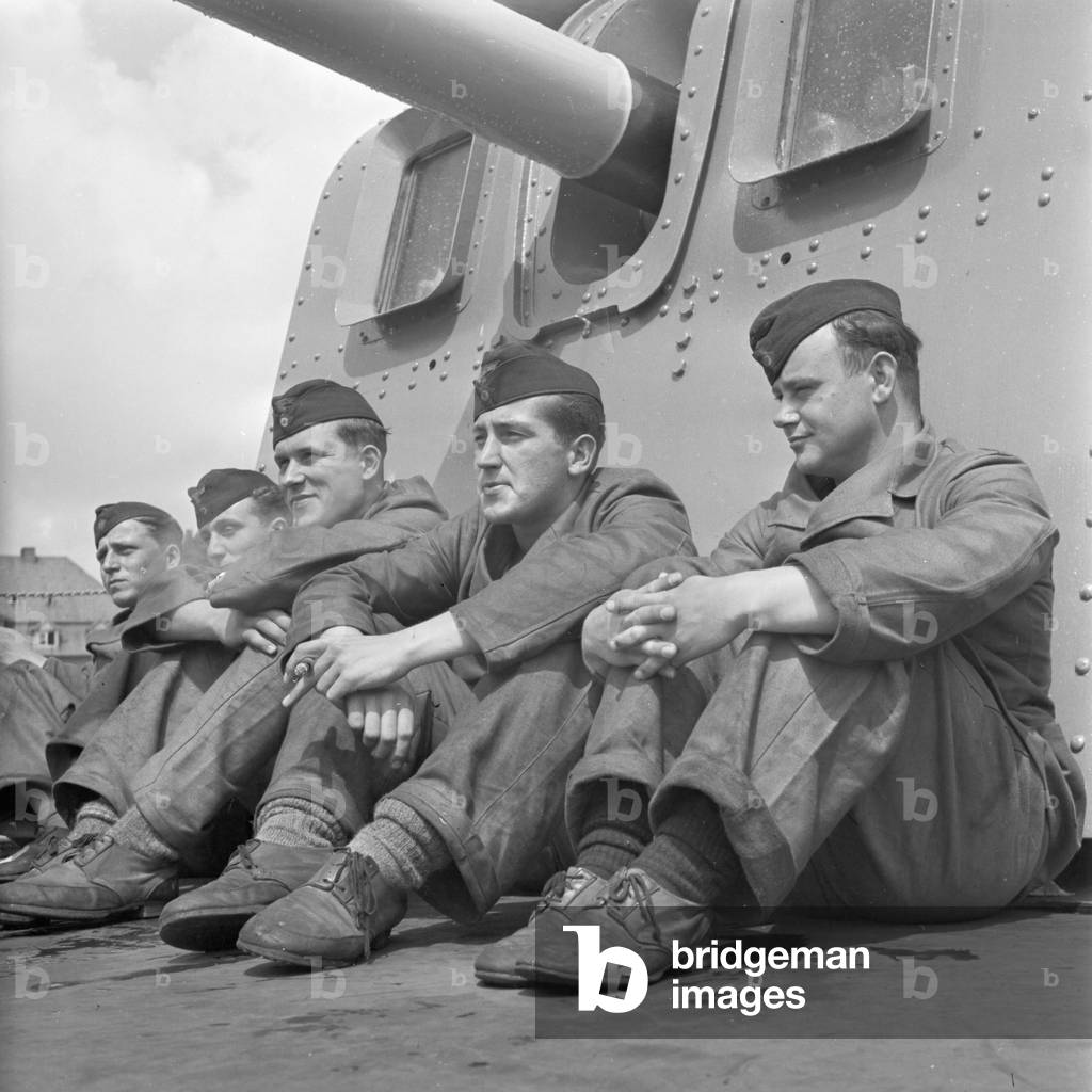 Sailor's leisure: tanning on deck of a torpedo boat, Germany 1940s (b/w photo)