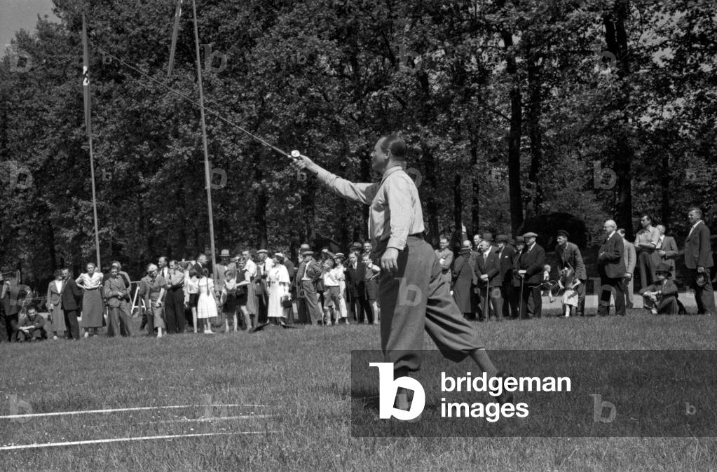 A man doing a fry run in angling at a lawn, Germany 1930s (b/w photo)