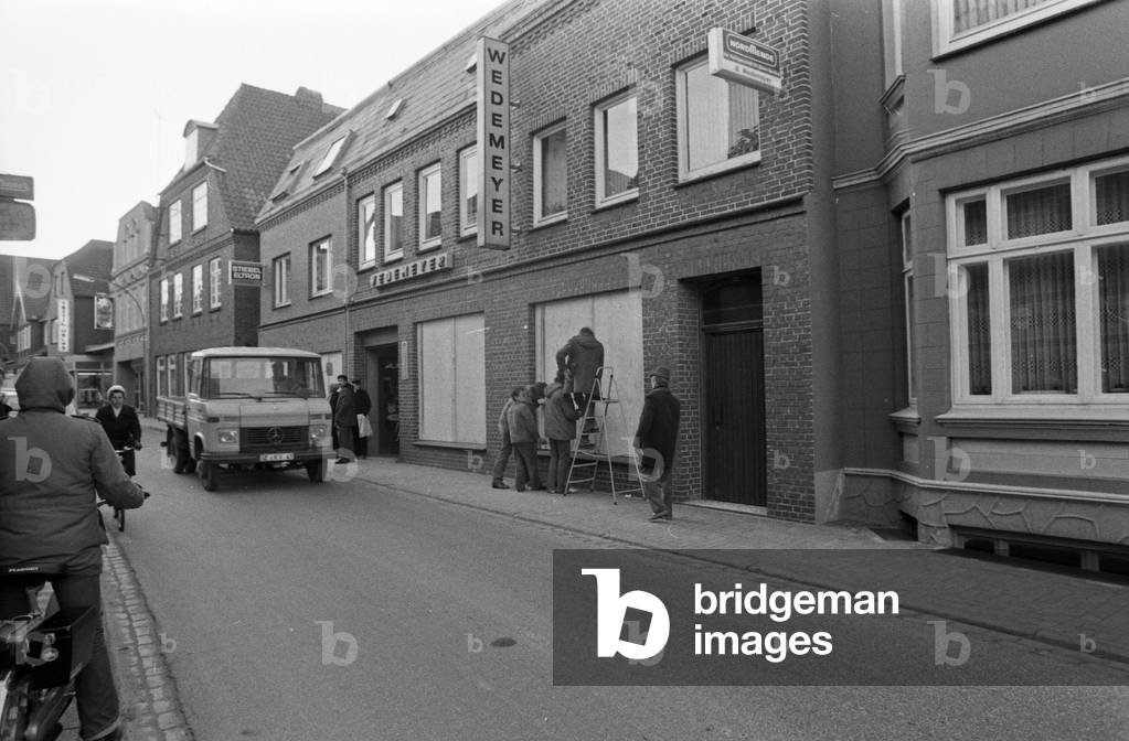Inhabitants of Brokdorf taking care for their windows before the demonstration, Germany 1980s