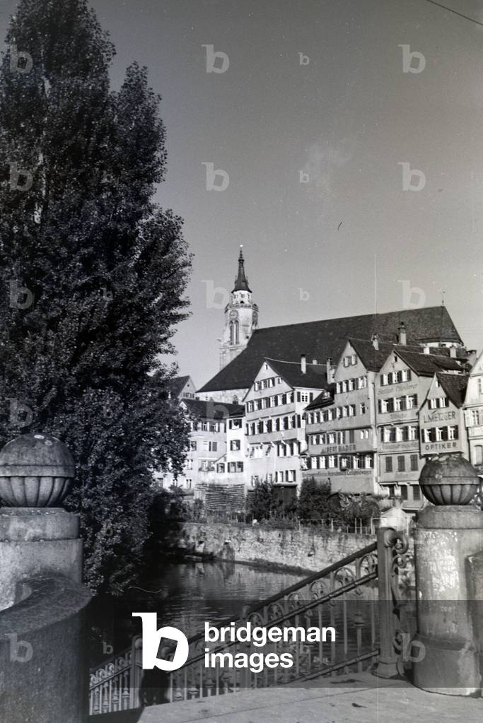 The Neckarfront with the Stiftskirche, abbey church tower in Tübingen, Germany 1930s (b/w photo)