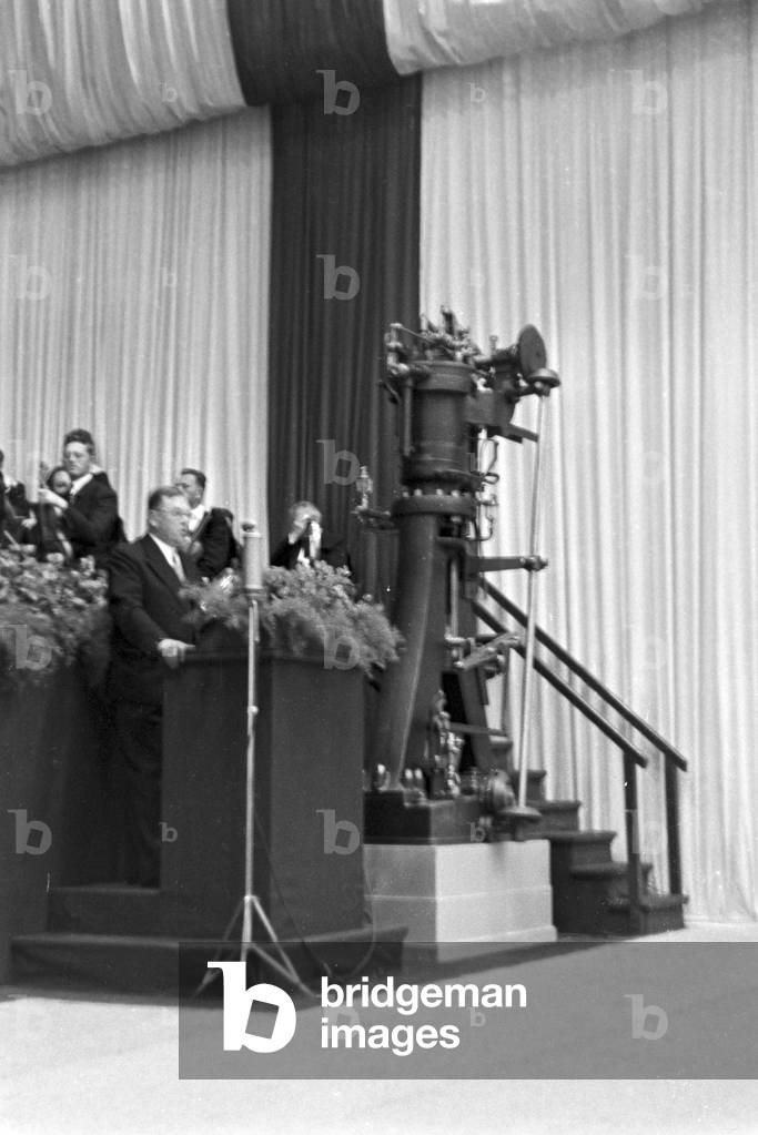 Speaker on the Diesel anniversary at the MAN factory at Augsburg, Germany 1930s (b/w photo)