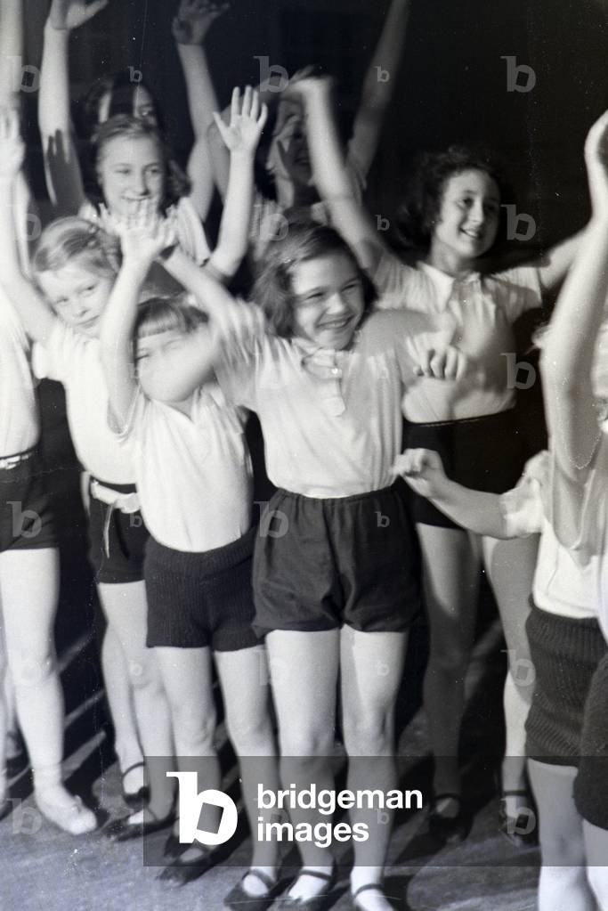 Children performing a dance, Germany 1930s (b/w photo)