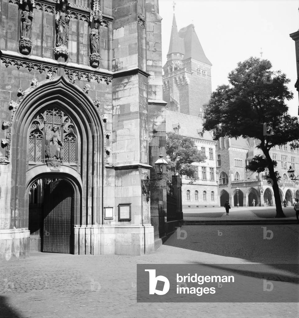 View from a church gate of the minster to Aachen city hall, Germany 1930s (b/w photo)