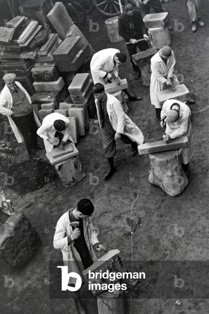 Trainees of a chiseller school at a tutorial, Germany 1937 (b/w photo)