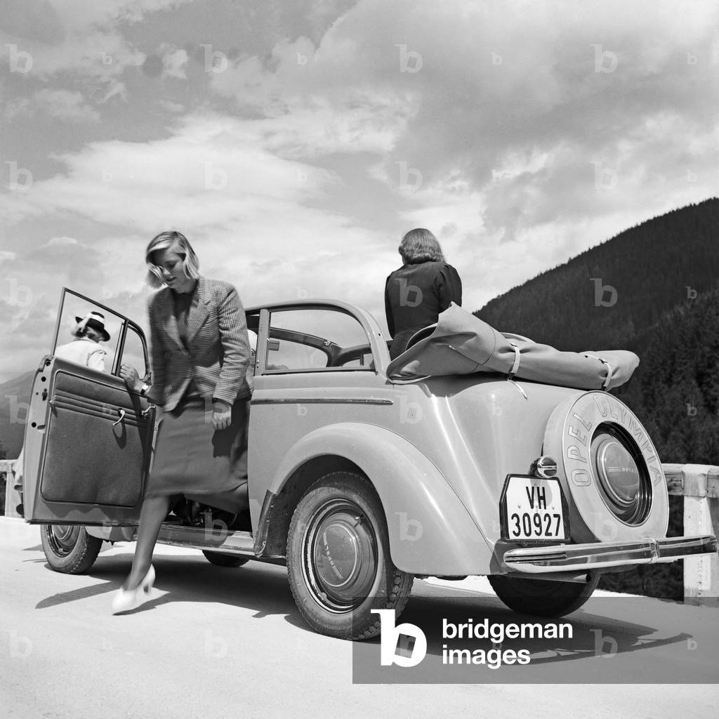 On the road with an Opel model Olympia at the Wachau area in Austria, Germany 1930s (b/w photo)