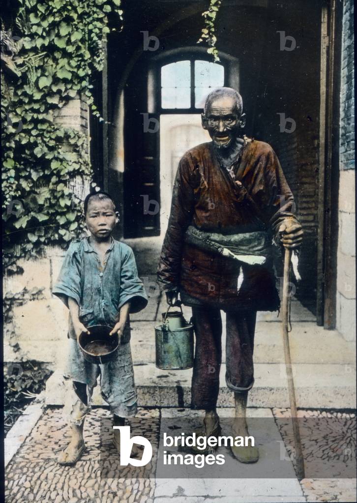 China, two helper in a monastery, image date: circa 1910, Carl Simon Archive