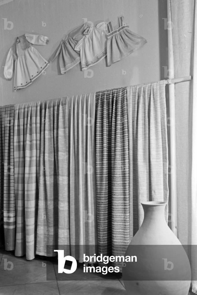 Products of Adolf Bauer & Sons' weaving mill as exhibits, Germany 1940s (b/w photo)