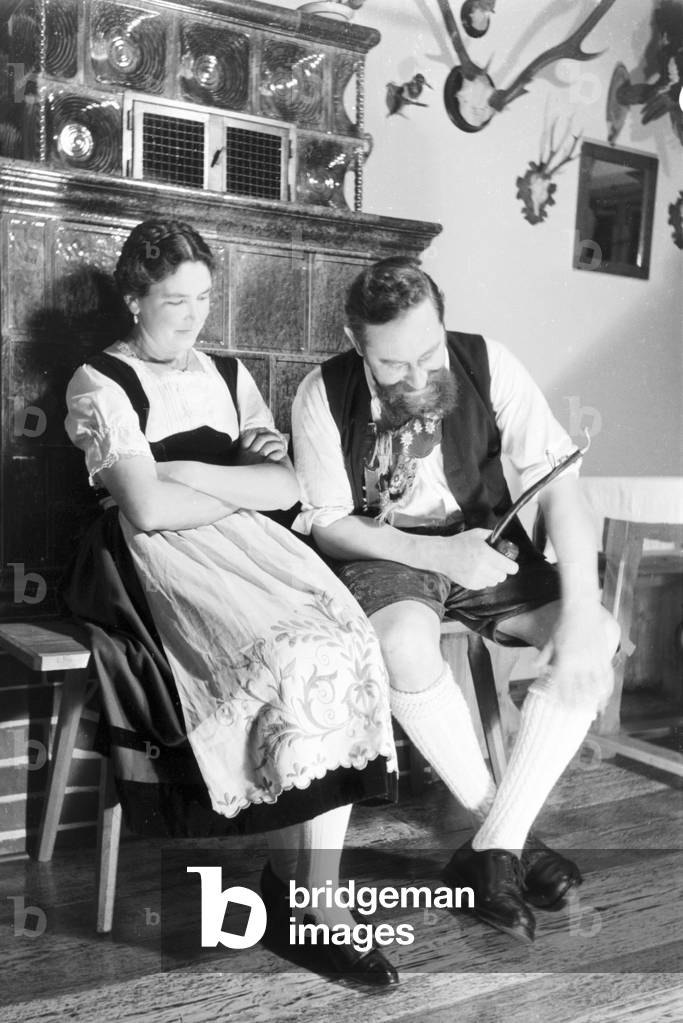 A couple from Bad Tölz wearing a traditional Tracht, Germany 1930s (b/w photo)