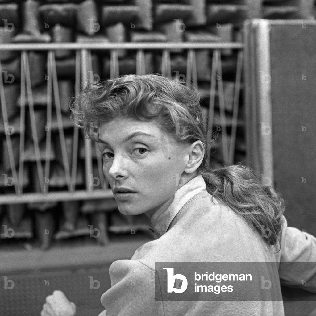 A German female audio play speaker at a production in Hamburg, Germany 1950s