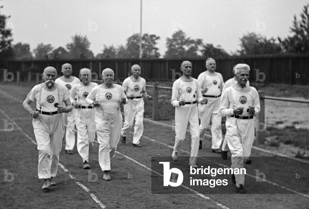 Members of a senior department of a gymnastic club exercising, Germany 1930s (b/w photo)