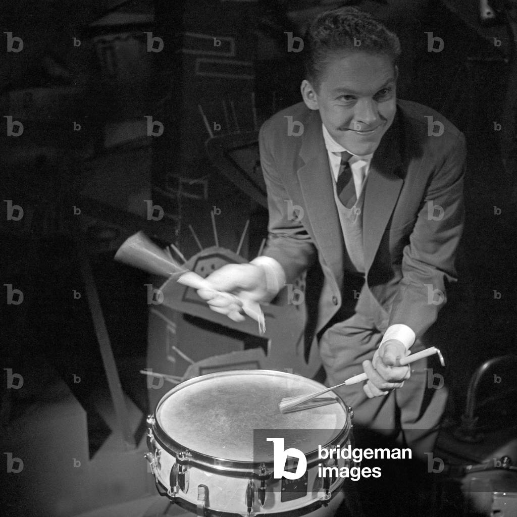 A drummer with his tools, Germany 1950s