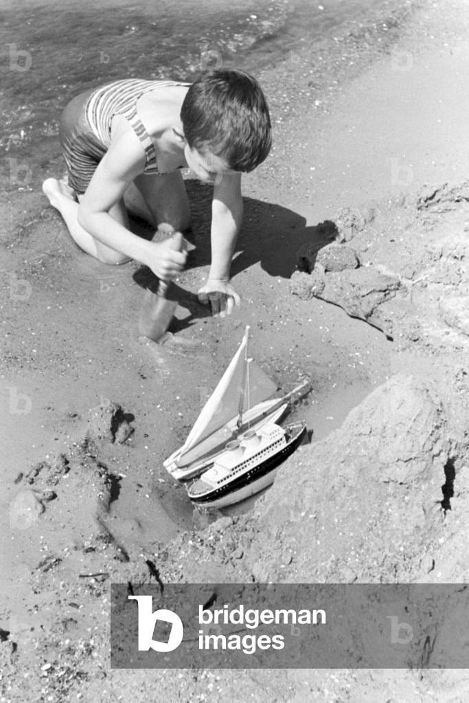 Little boy at lake Wannsee lido in Berlin, Germany 1930s (b/w photo)