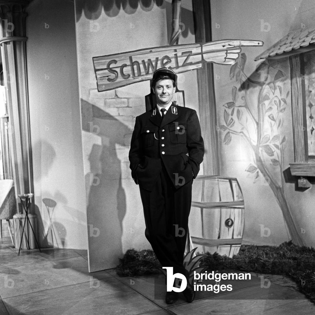 Swiss journalist Guido Baumann acting as border patrol man, Germany 1950s