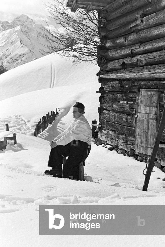 Winter landscape with a skier, Germany 1930s (b/w photo)
