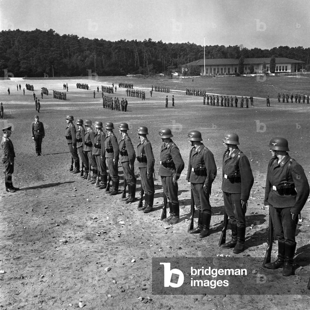 On the drill ground: every soldier gets a proper military education with the rifle (b/w photo)
