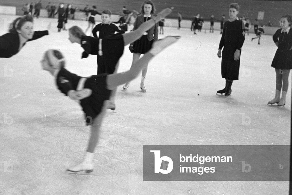 A group of Hitler Youth members during a training, coached by the Austrian figureskater and Olympics champion Karl Sch/Sfer in an ice stadium in Dortmund, Germany 1930s