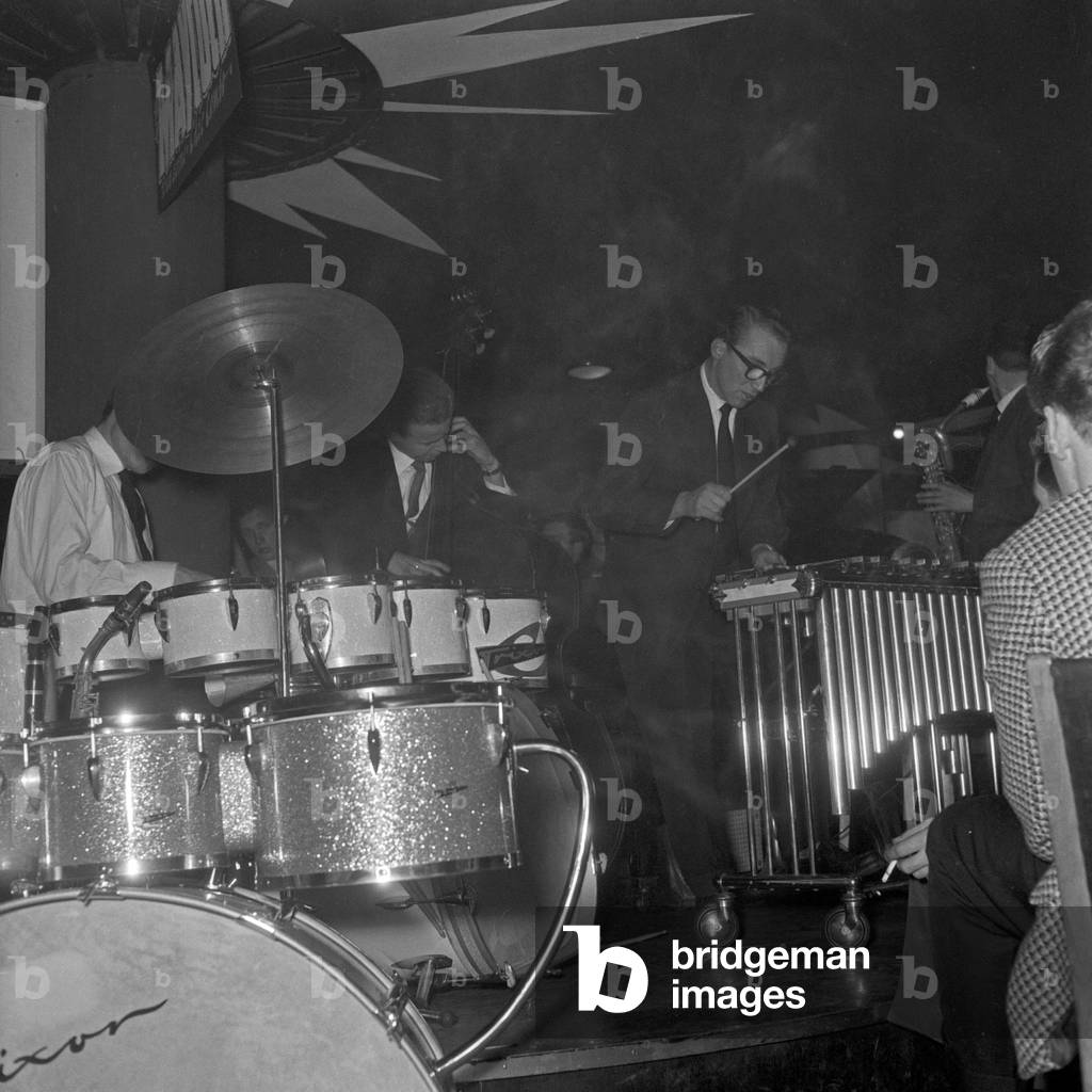Drummer and percussionist at a jazz concert in a small club at Hamburg, Germany 1950s