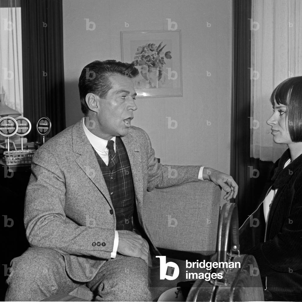 American actor George Nader in an interview at Hamburg, Germany 1960s