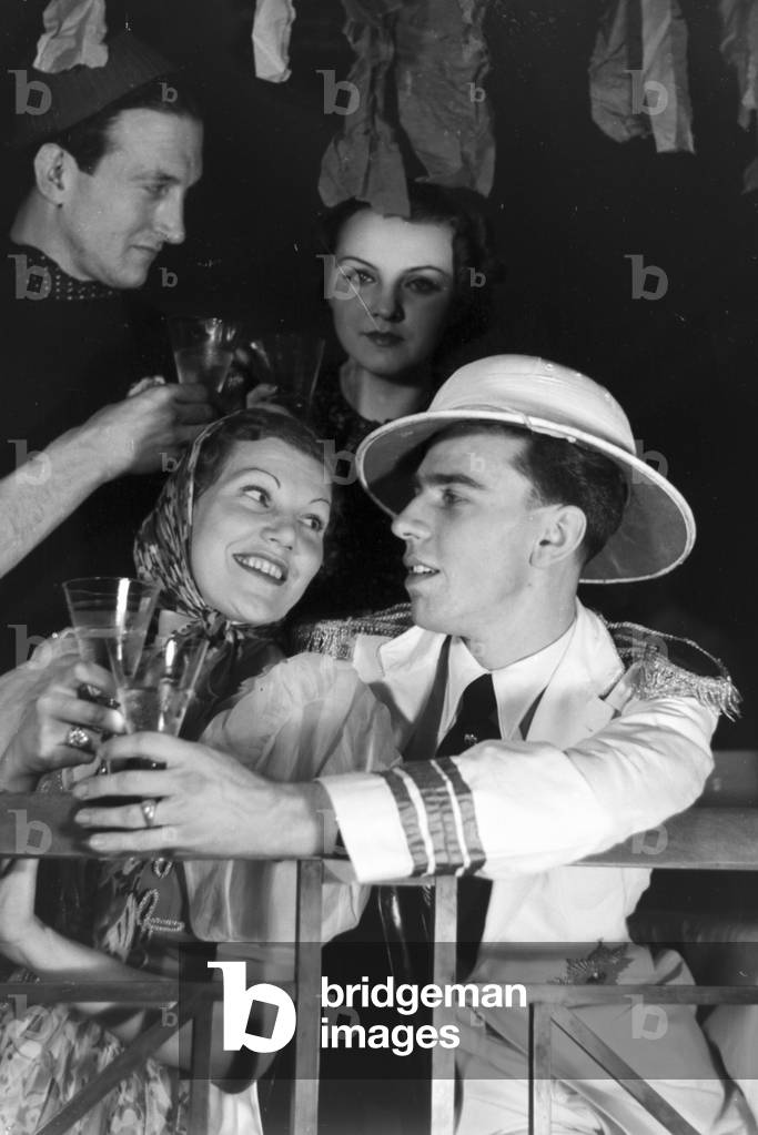 Guests of a carnival party, Germany 1930s (b/w photo)