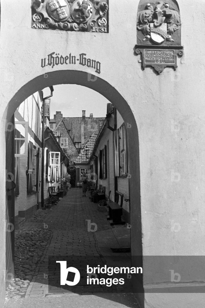 At the old city of Luebeck, Germany 1930s (b/w photo)