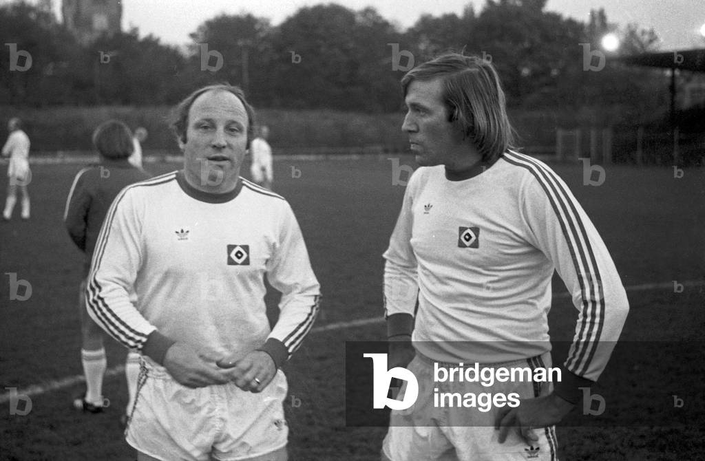 German football players Guenter Netzer and Uwe Seeler at a senior charity match, Germany late 1970s