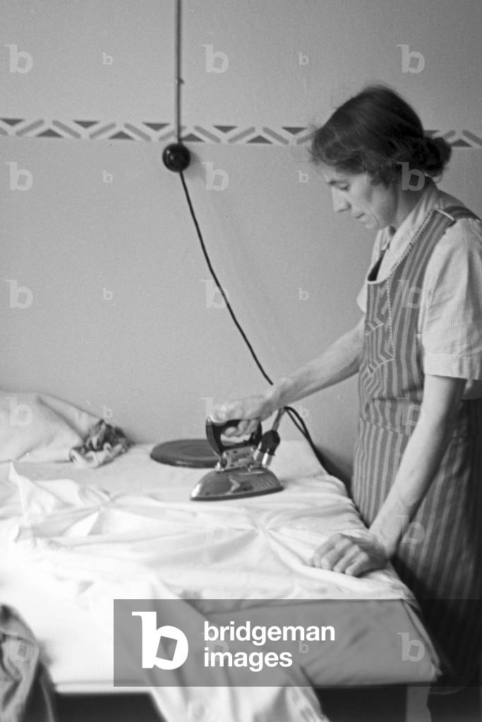 Scenes from everyday life of a agricultural firm, Germany 1930s (b/w photo)