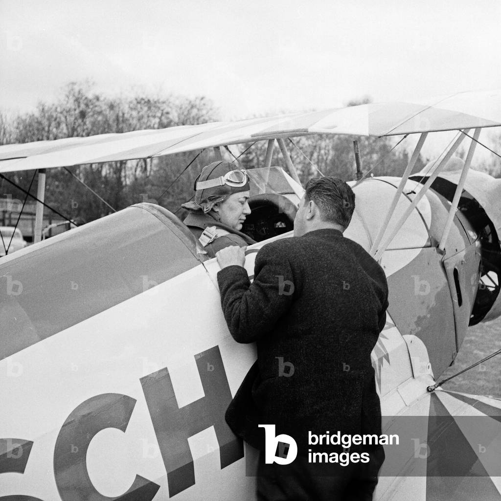 German stunt pilot Albert Falderbaum in his Buecker Bue 133 biplane, Germany 1960s