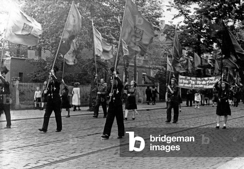 FDJ youth organization marching through the streets of Dresden, GDR 1950s