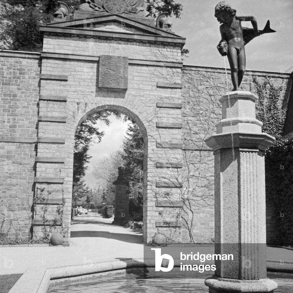Fountain in the gardens of spa resort Buehlerhohe in the Black Forest region, Germany 1930s (b/w photo)