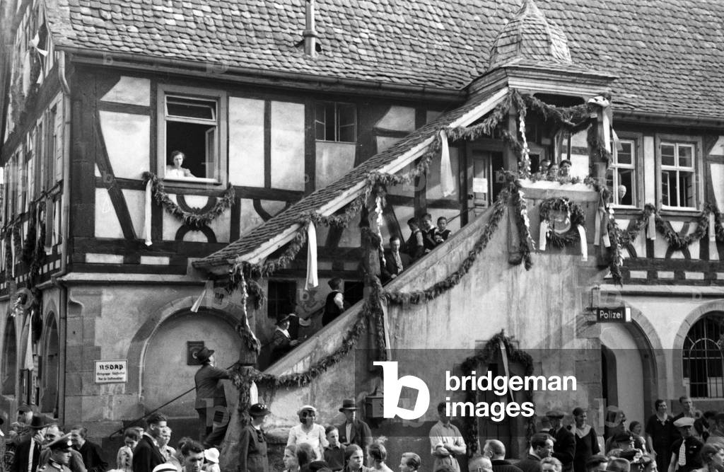 Annual radish fair carnival in front of the city hall at Schifferstadt, Germany 1930s (b/w photo)