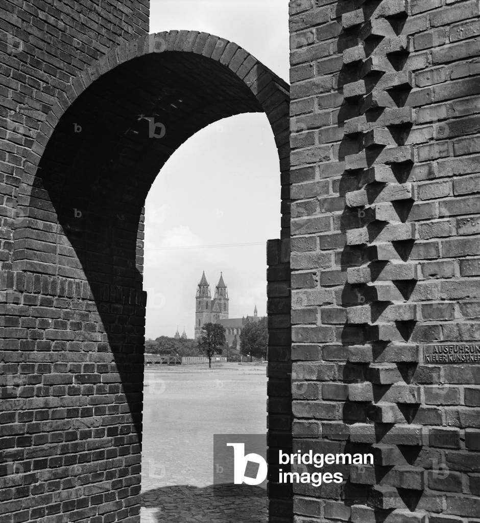View through an arch to Magdeburg cathedral, Germany 1930s (b/w photo)