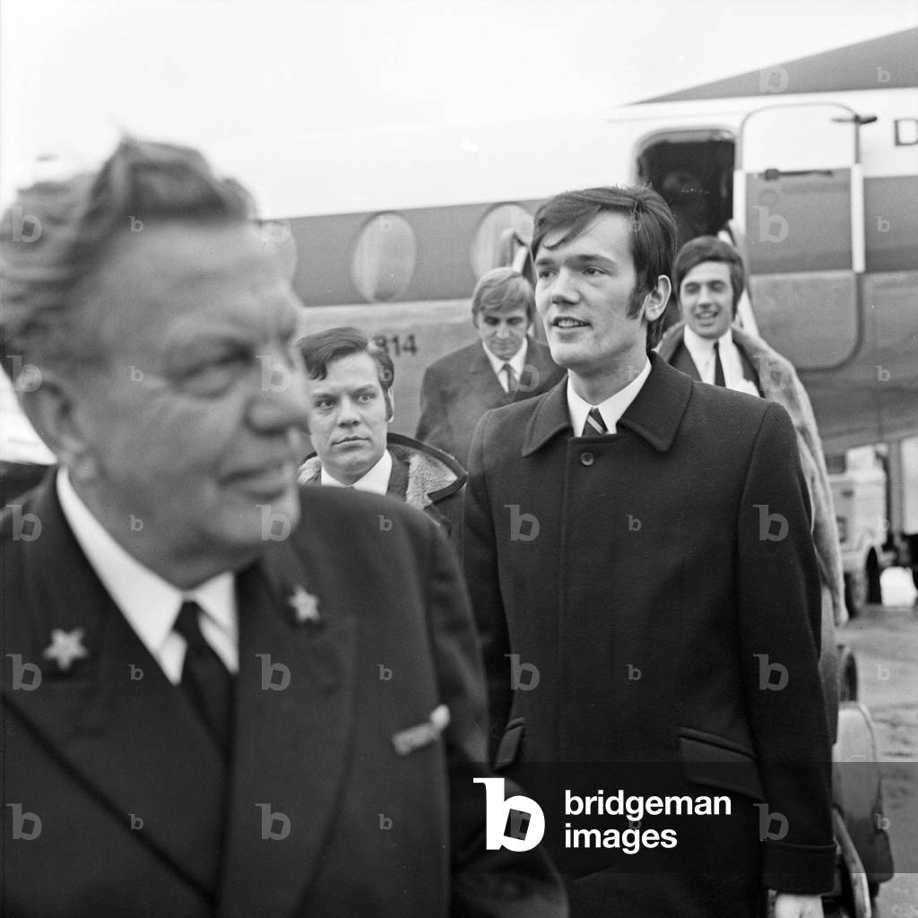 DJ Pascal Rose (right) arriving at Hamburg airport to launch a pirate radio station on the vessel 