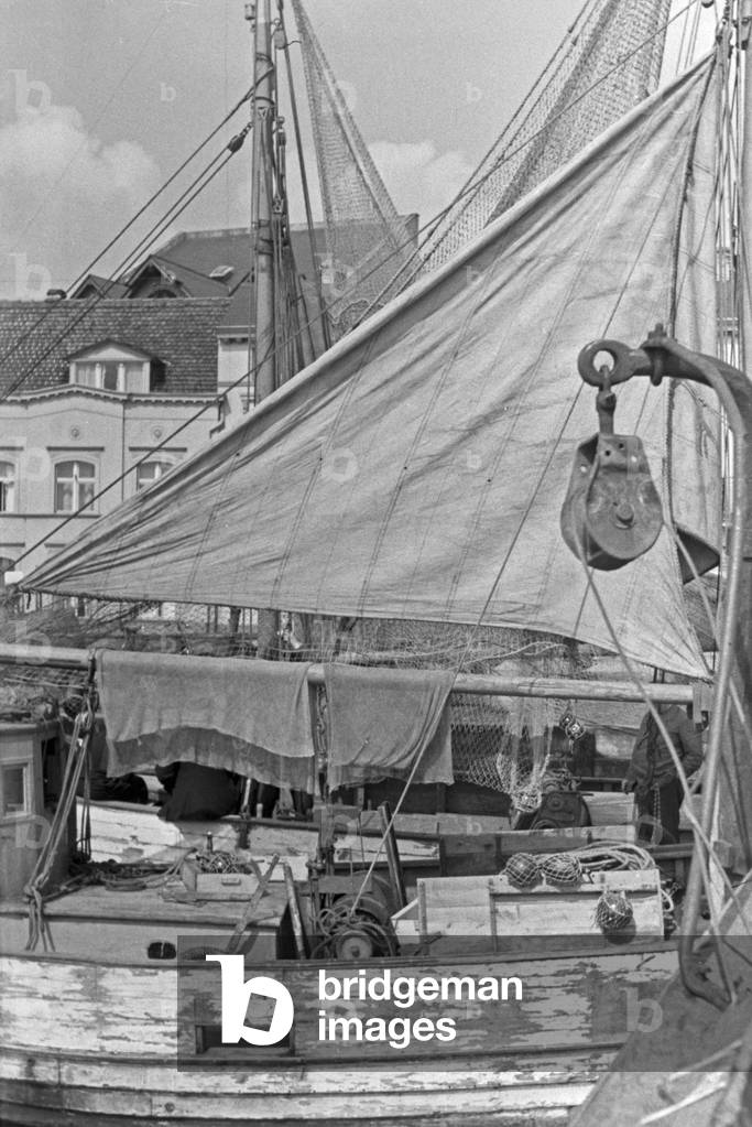 Fishing boats at the harbor, Germany 1930s (b/w photo)