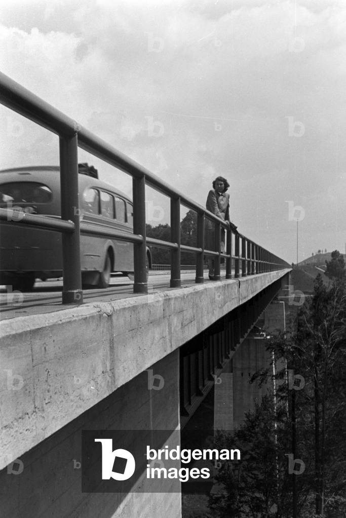 On Mangfallbruecke bridge near Weyarn in Bavaria, Germany 1930s (b/w photo)