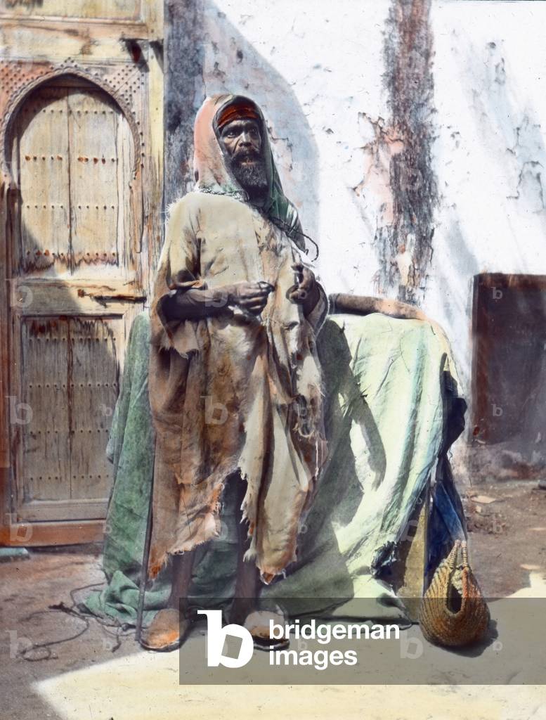 Morocco, blind beggar in Tangier, image date: circa 1910. Carl Simon Archive
