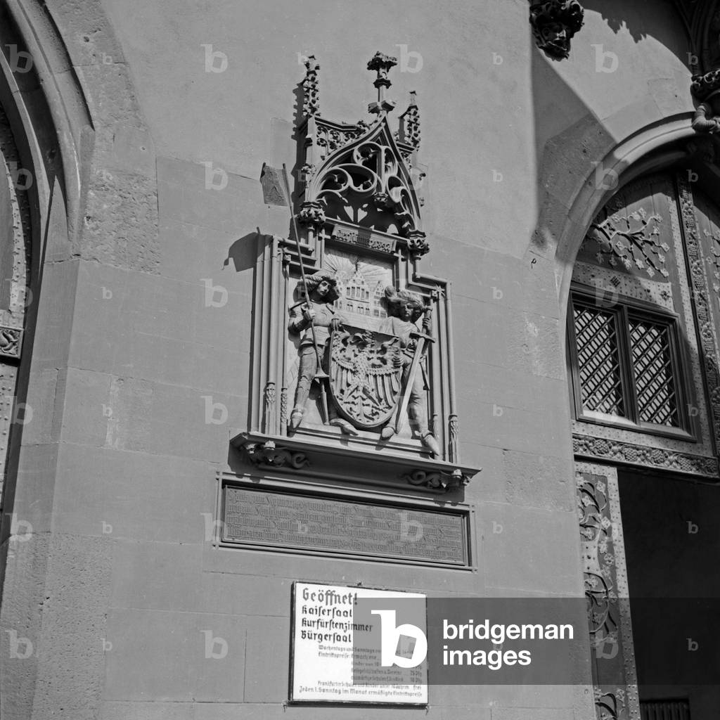 coat of arms and admission prices at the entrance to the Roemer at Frankfurt, Germany 1930s (b/w photo)