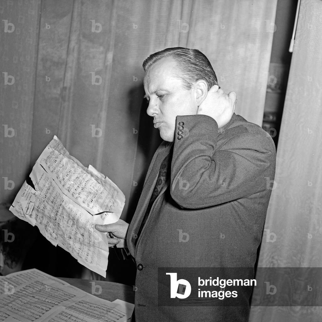 A composer trying to arrange a compsition at Hamburg, Germany 1950s