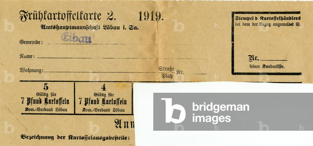 Germany , Weimarer Republic , food ration cards for new potatoes of the municipality of Eibau / Oberlausitz / Saxony , district of Loebau , 1919 , many parts of this card are cutted out. Keywords : the First World War , WW I , postwar era , rationing , providing , misery , poverty , plight , household , housekeeping , food