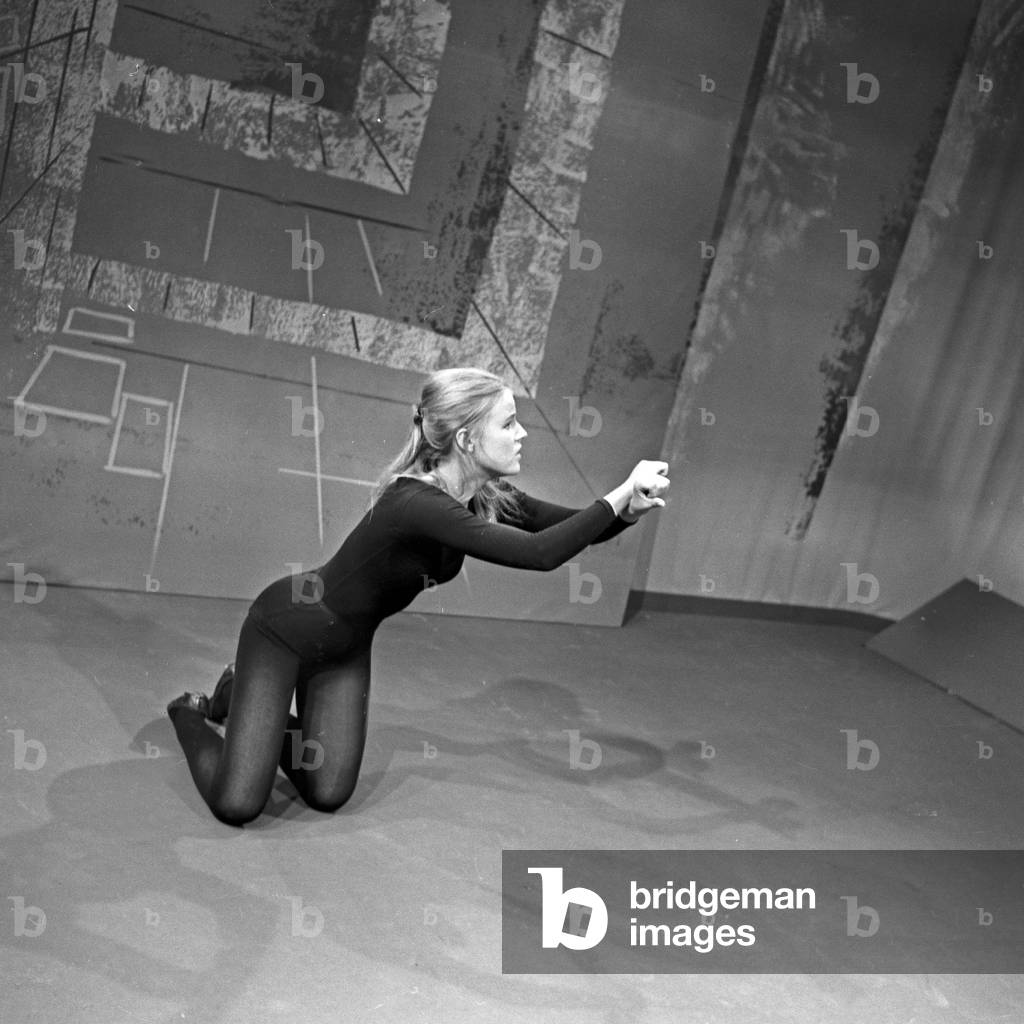 A woman presenting classical pantomime at Hamburg, Germany 1960s