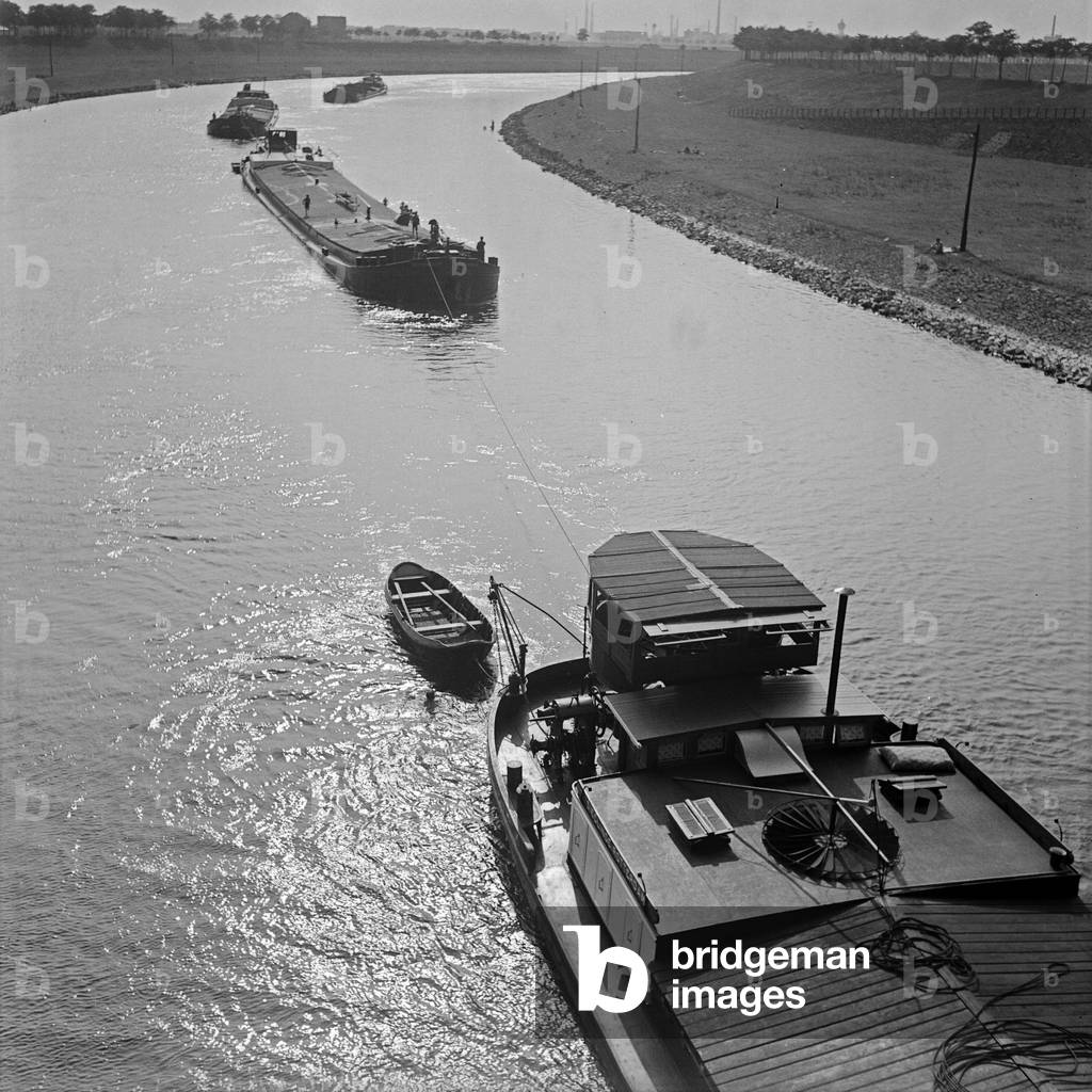 Towboats on the river Rhine near Duisburg, Germany 1930s (b/w photo)