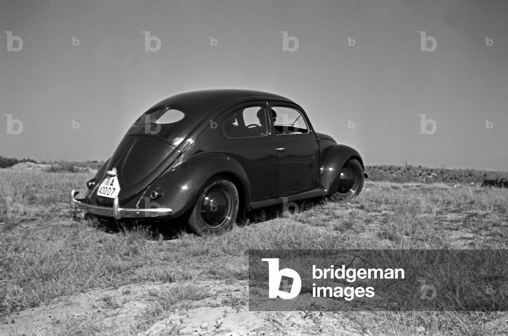 Rear end of the Volkswagen beetle, or KdF car, on the test track near Wolfsburg, Germany 1930s (b/w photo)