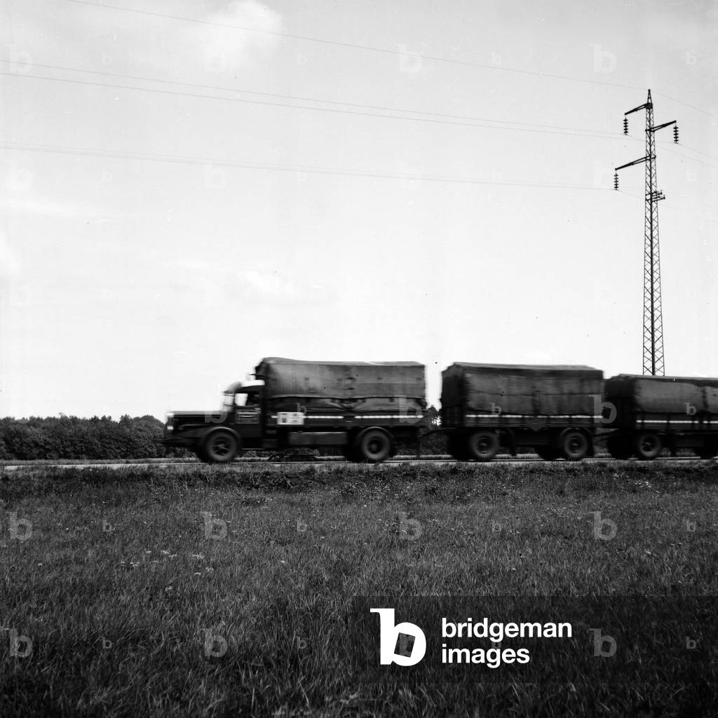 A truck with two trailers on its way through the Rhoen area, German 1930s (b/w photo)