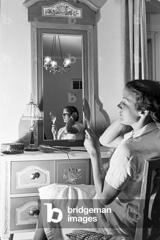 Relaxation in the Hotel during a journey in the Black Forest, Germany 1930s (b/w photo)