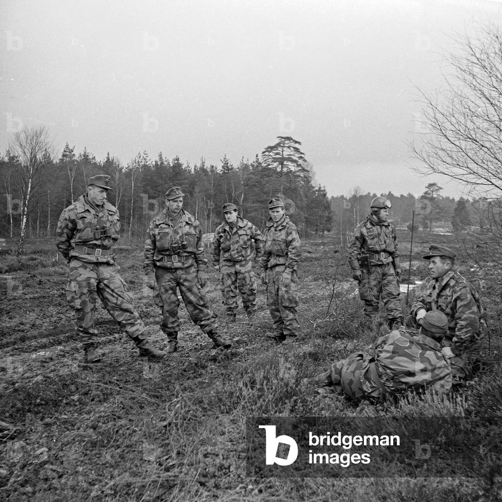 With soldiers of the German Bundeswehr army at the military exercising ground, Germany 1950s
