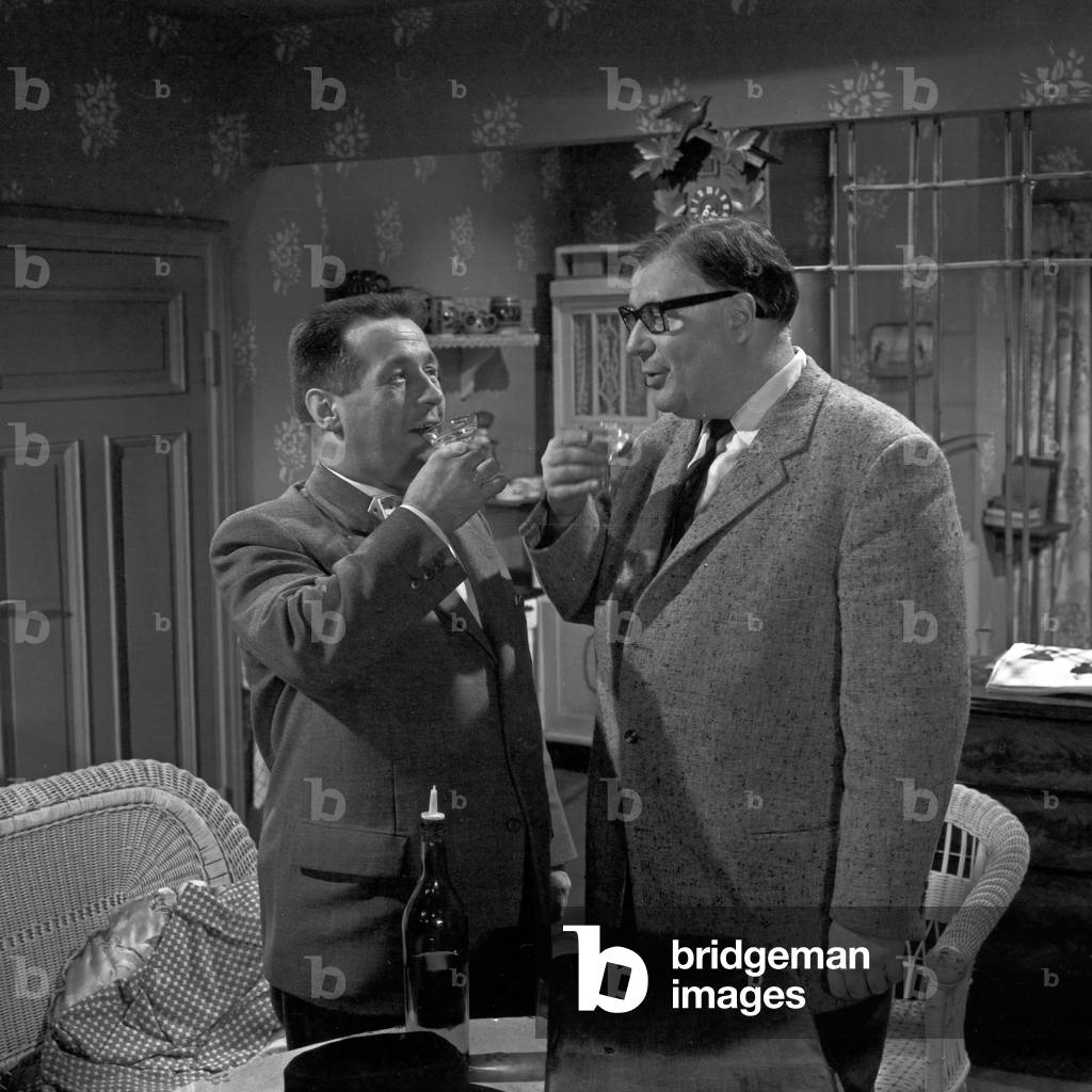 German comedian Heinz Erhardt having a brandy, Germany 1960s